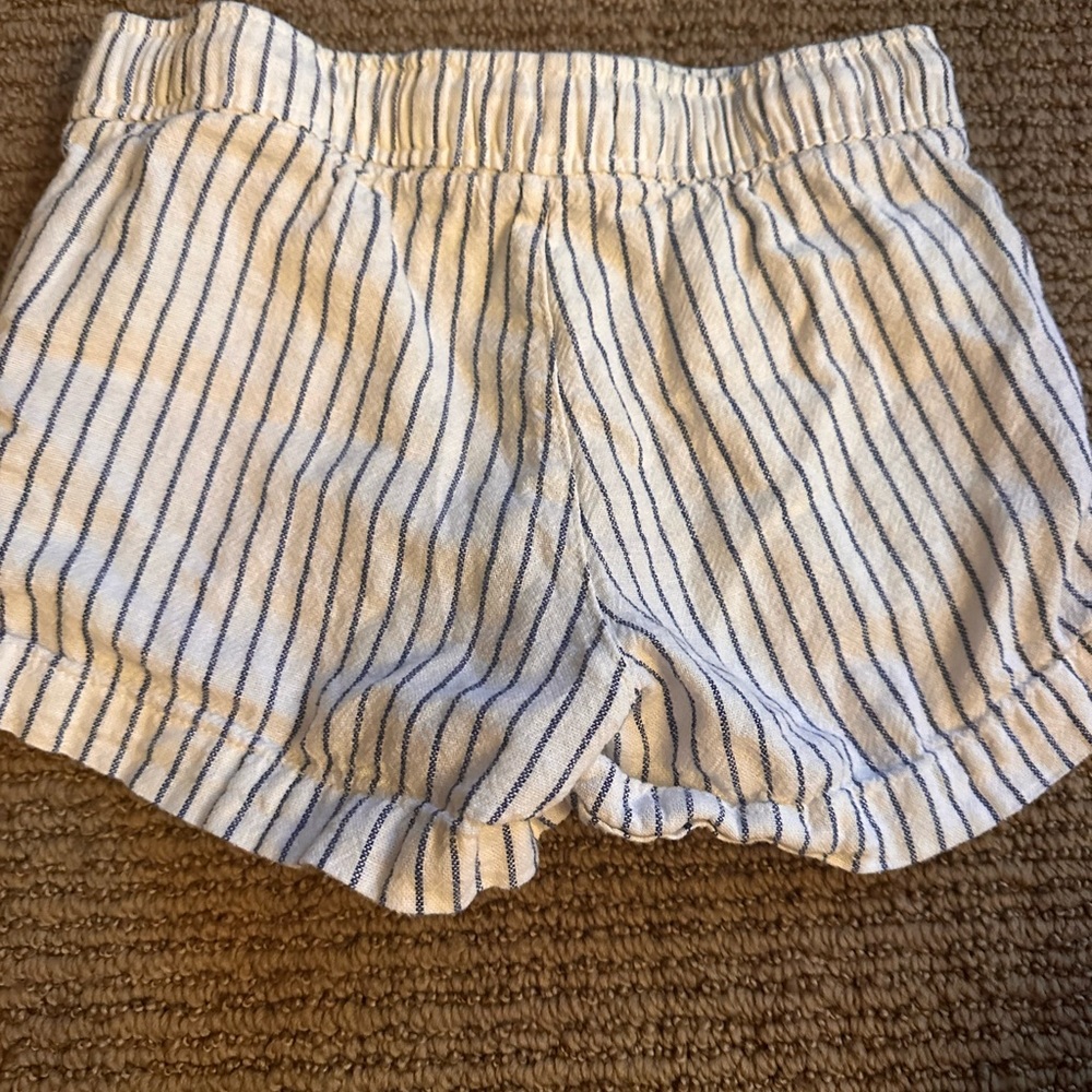 Old navy, good shape, tie able shorts and have stripes on them